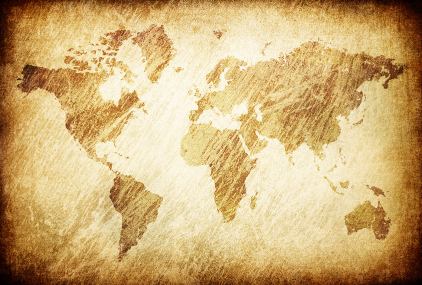 Grunge rubbed map of the world background.